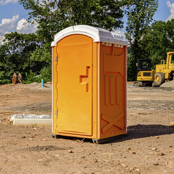 what is the cost difference between standard and deluxe portable restroom rentals in Peters